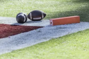 USA: kirúgtak egy futballedzőt az iskola területén tartott vízkeresztség miatt